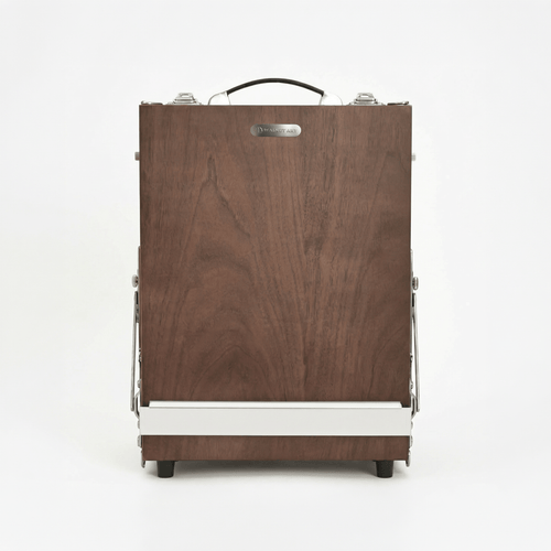 Wooden suitcase with a white base on a white background