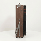 Wooden camera with leather strap on a white background
