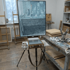 Art studio with an easel displaying a painting and art supplies on a table.